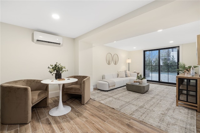 7 Champlin St, Newport, RI 02840 - living room with baseboards, an AC wall unit, recessed lighting, and wood finished floors