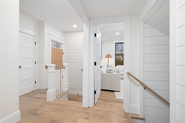 7 Champlin St, Newport, RI 02840 - hallway featuring recessed lighting, light wood-style flooring, and an upstairs landing