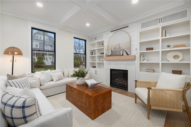 7 Champlin St, Newport, RI 02840 - living area featuring a high end fireplace, crown molding, light wood-type flooring, beam ceiling, and recessed lighting