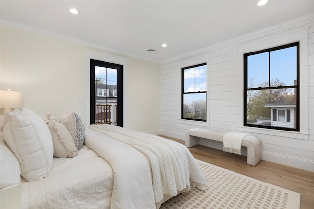 7 Champlin St, Newport, RI 02840 - bedroom with access to outside, recessed lighting, wood finished floors, visible vents, and ornamental molding