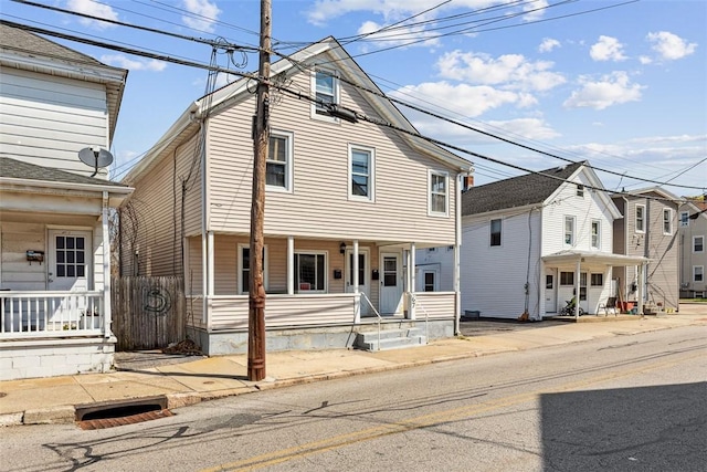 67 Pleasant St, Westerly, RI 02891 - view of front of home featuring covered porch and fence