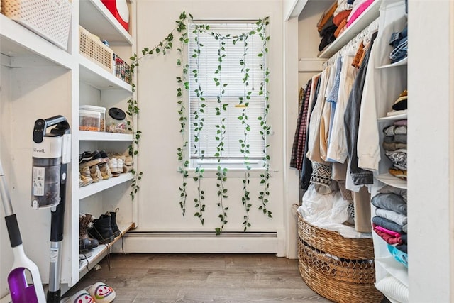 67 Pleasant St, Westerly, RI 02891 - walk in closet with baseboard heating and wood finished floors