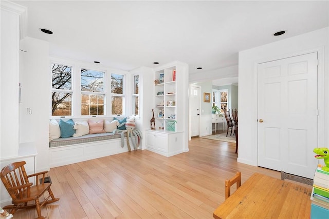 living area featuring light wood-style flooring