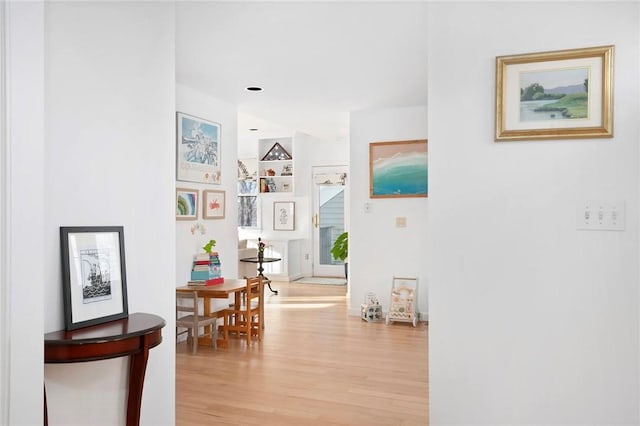 hall with light wood-style flooring