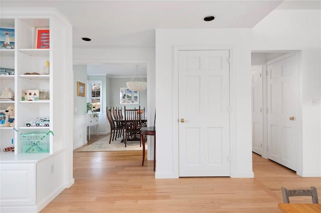 hallway with light wood-type flooring