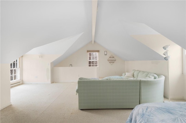 bedroom featuring carpet floors, vaulted ceiling with beams, and baseboards