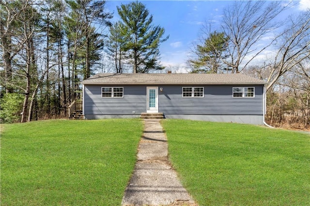 view of front of house with a front lawn