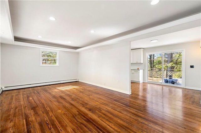 interior space with plenty of natural light and wood finished floors