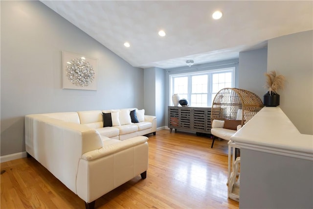 32 Dike St, Woonsocket, RI 02895 - living room with baseboards, recessed lighting, light wood finished floors, and lofted ceiling