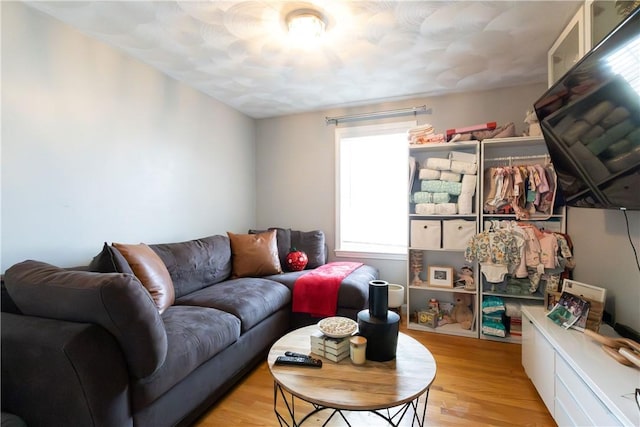 32 Dike St, Woonsocket, RI 02895 - living room featuring wood finished floors