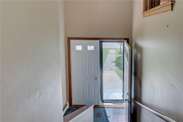 entrance foyer with a baseboard heating unit