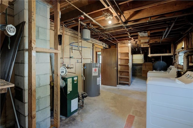 unfinished basement with water heater and independent washer and dryer