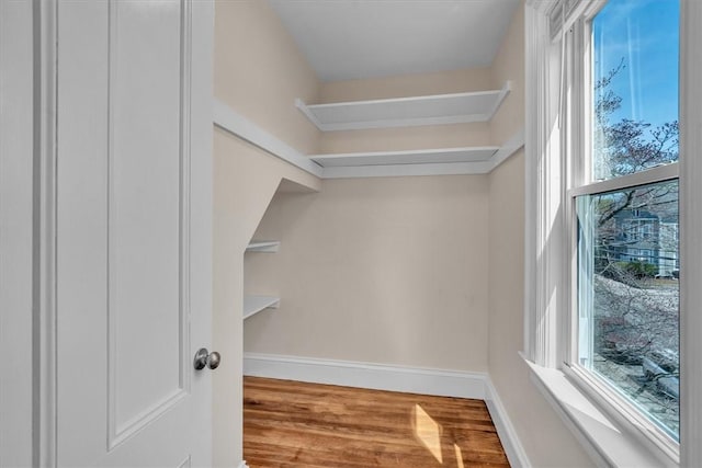32 Summer St, Woonsocket, RI 02895 - walk in closet featuring wood finished floors