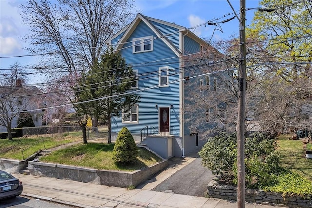 32 Summer St, Woonsocket, RI 02895 - view of front of home featuring fence