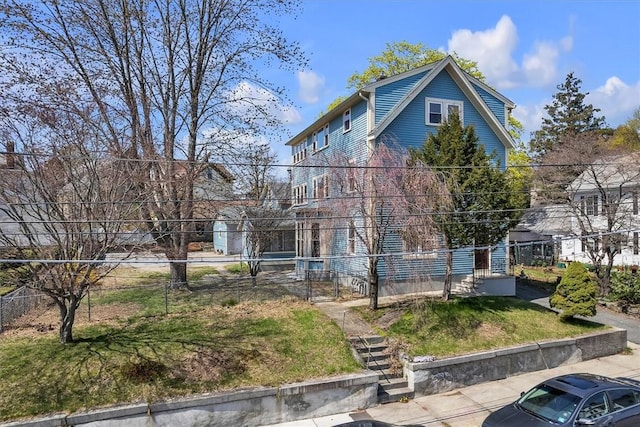 32 Summer St, Woonsocket, RI 02895 - view of front facade with fence and stairway
