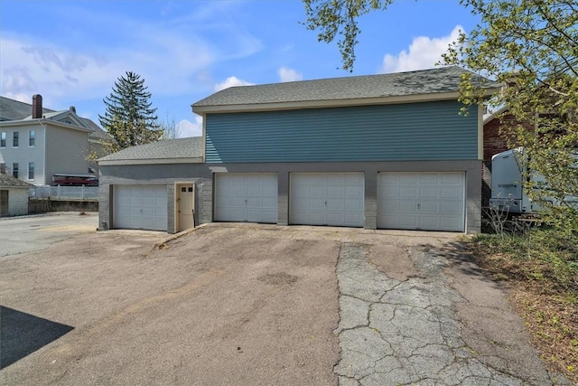 32 Summer St, Woonsocket, RI 02895 - garage featuring driveway