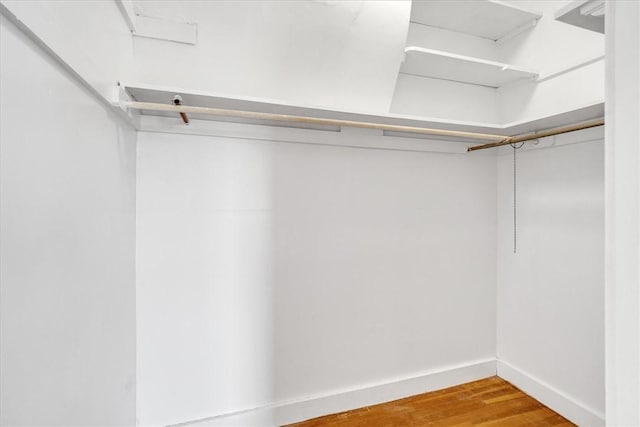 32 Summer St, Woonsocket, RI 02895 - spacious closet with attic access and wood finished floors