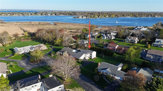 aerial view with a water view and a residential view