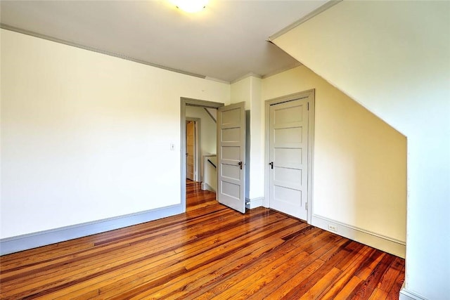 bonus room featuring wood finished floors