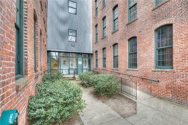 entrance to property with brick siding