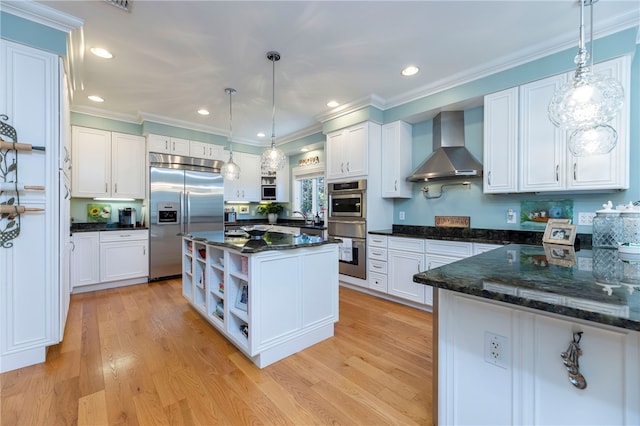 16 Central St, Charlestown, RI 02813 - kitchen with open shelves, wall chimney exhaust hood, stainless steel appliances, white cabinetry, and a warming drawer