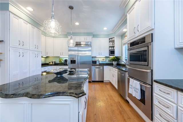 16 Central St, Charlestown, RI 02813 - kitchen featuring white cabinetry, open shelves, appliances with stainless steel finishes, and light wood-style flooring