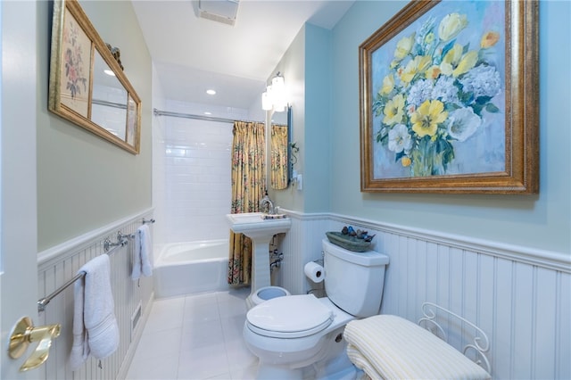 16 Central St, Charlestown, RI 02813 - full bathroom with tile patterned flooring, visible vents, wainscoting, toilet, and shower / bath combo