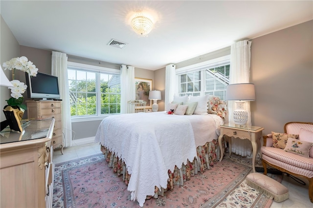 16 Central St, Charlestown, RI 02813 - bedroom featuring baseboards, visible vents, and light tile patterned floors