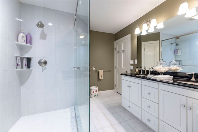 16 Central St, Charlestown, RI 02813 - bathroom featuring a sink, tile patterned floors, a tile shower, and double vanity