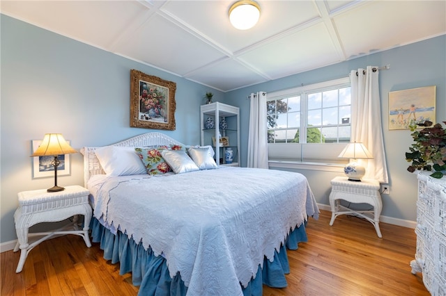 16 Central St, Charlestown, RI 02813 - bedroom with baseboards, beam ceiling, coffered ceiling, and light wood-style flooring