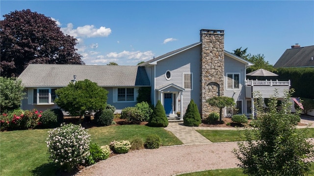 16 Central St, Charlestown, RI 02813 - mid-century home with a chimney and a front yard