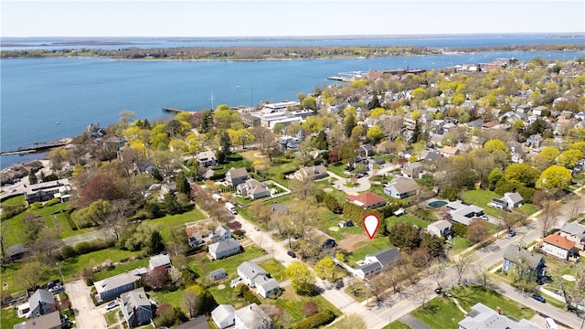 bird's eye view with a residential view and a water view