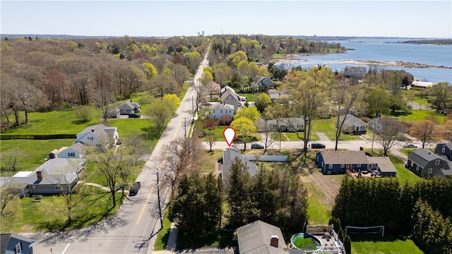 birds eye view of property featuring a water view and a residential view