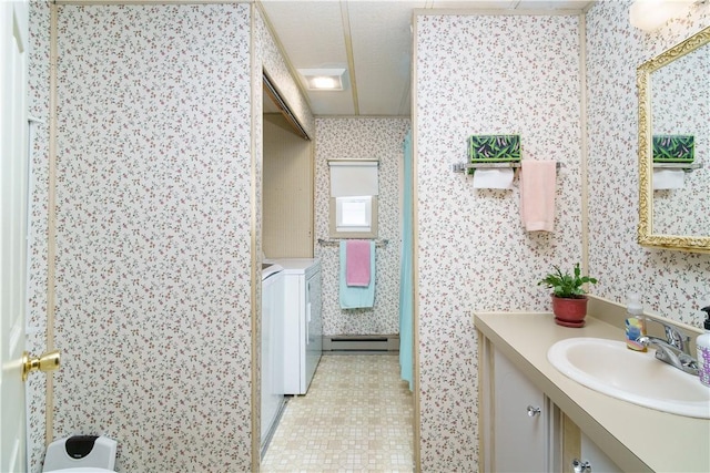 bathroom featuring vanity, tile patterned flooring, and wallpapered walls