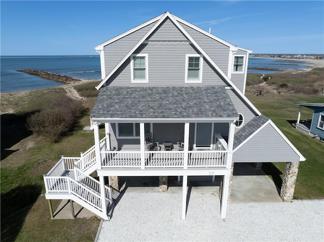53 Stanton Ave, Narragansett, RI 02882 - rear view of property with roof with shingles, a water view, and a porch