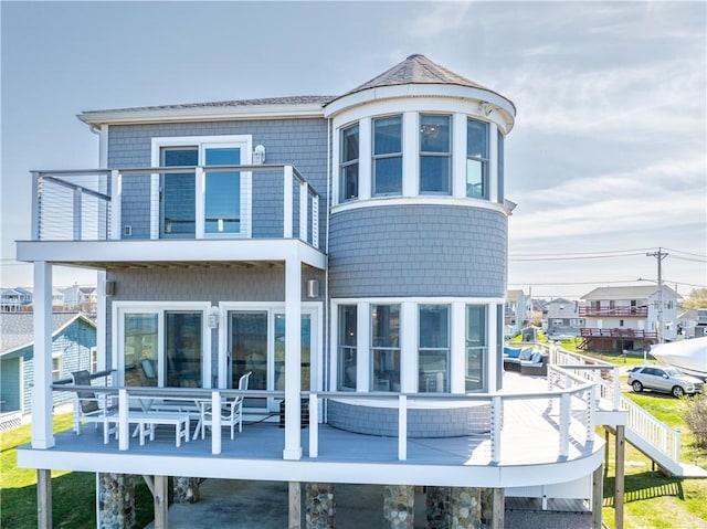 53 Stanton Ave, Narragansett, RI 02882 - back of house featuring a balcony