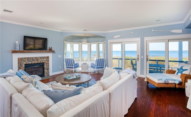 53 Stanton Ave, Narragansett, RI 02882 - living room featuring baseboards, visible vents, a healthy amount of sunlight, and wood finished floors