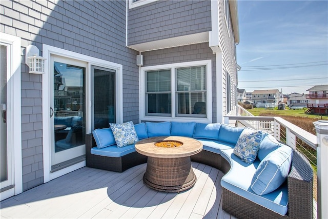 53 Stanton Ave, Narragansett, RI 02882 - wooden terrace featuring an outdoor living space with a fire pit