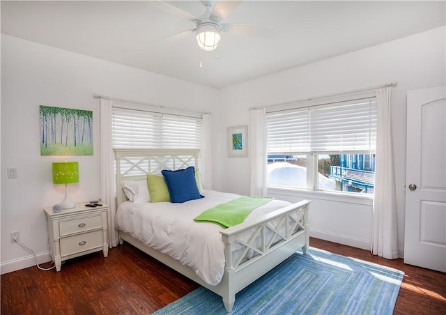 53 Stanton Ave, Narragansett, RI 02882 - bedroom featuring baseboards, wood finished floors, and multiple windows