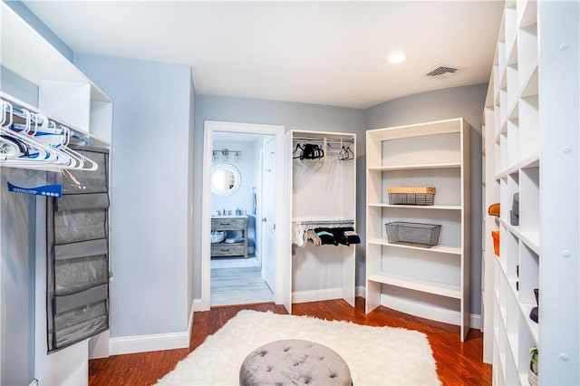 53 Stanton Ave, Narragansett, RI 02882 - spacious closet featuring visible vents and wood finished floors
