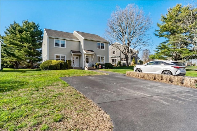 86 Quannacut Rd Unit A, Westerly, RI 02891 - view of front of house featuring a front lawn