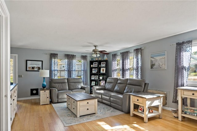 86 Quannacut Rd Unit A, Westerly, RI 02891 - living area featuring light wood-style floors, plenty of natural light, and ceiling fan
