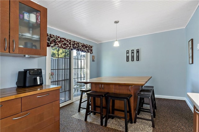 86 Quannacut Rd Unit A, Westerly, RI 02891 - dining room featuring crown molding and baseboards