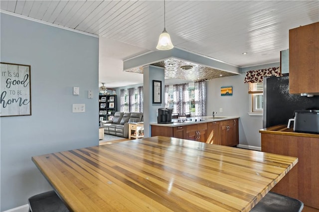 86 Quannacut Rd Unit A, Westerly, RI 02891 - dining room with ceiling fan and baseboards
