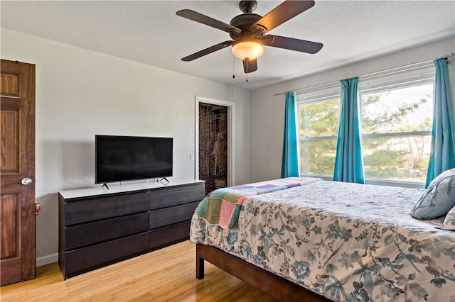 86 Quannacut Rd Unit A, Westerly, RI 02891 - bedroom with light wood finished floors and ceiling fan