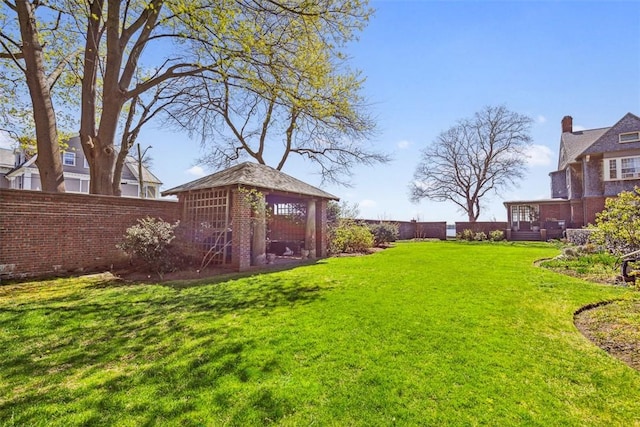 221 Hope St Unit 7, Bristol, RI 02809 - view of yard with a fenced backyard and an outdoor structure