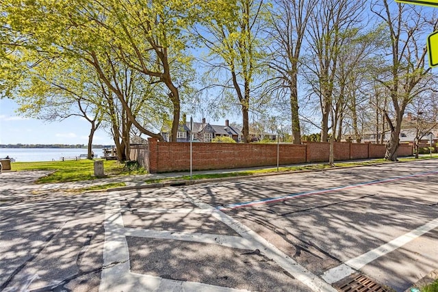 221 Hope St Unit 7, Bristol, RI 02809 - exterior space with fence and a water view
