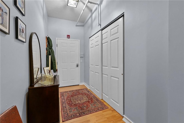 doorway to outside with wood finished floors