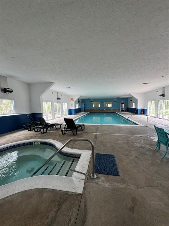 11 Cardinal Ct, Tiverton, RI 02878 - community pool featuring an indoor in ground hot tub