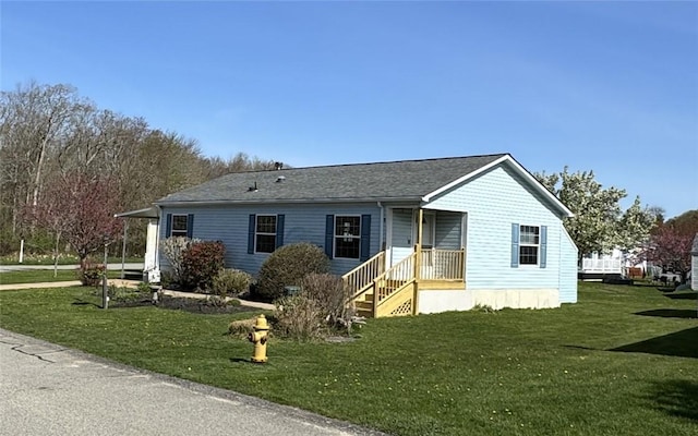 11 Cardinal Ct, Tiverton, RI 02878 - view of front facade with a front lawn